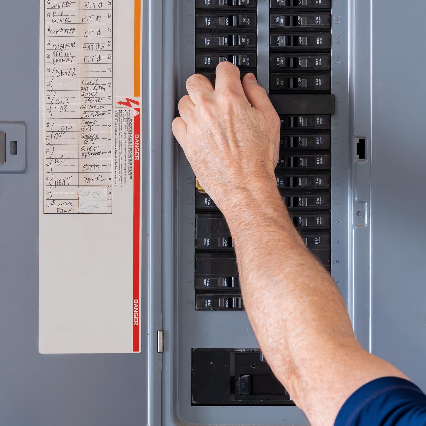 Resetting tripped breaker in residential electricity power panel
